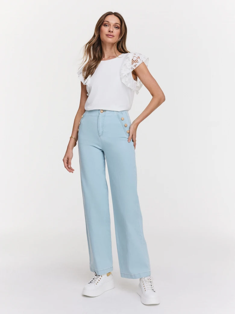 White blouse with embellished sleeves