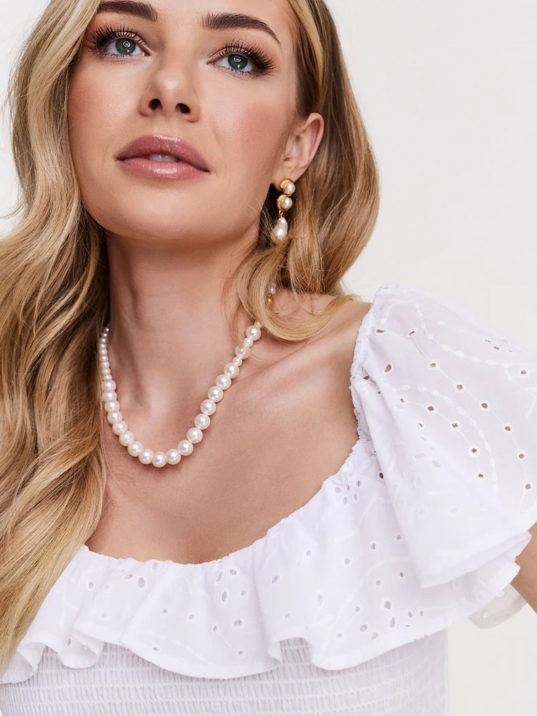 Decorative blouse with lace inserts