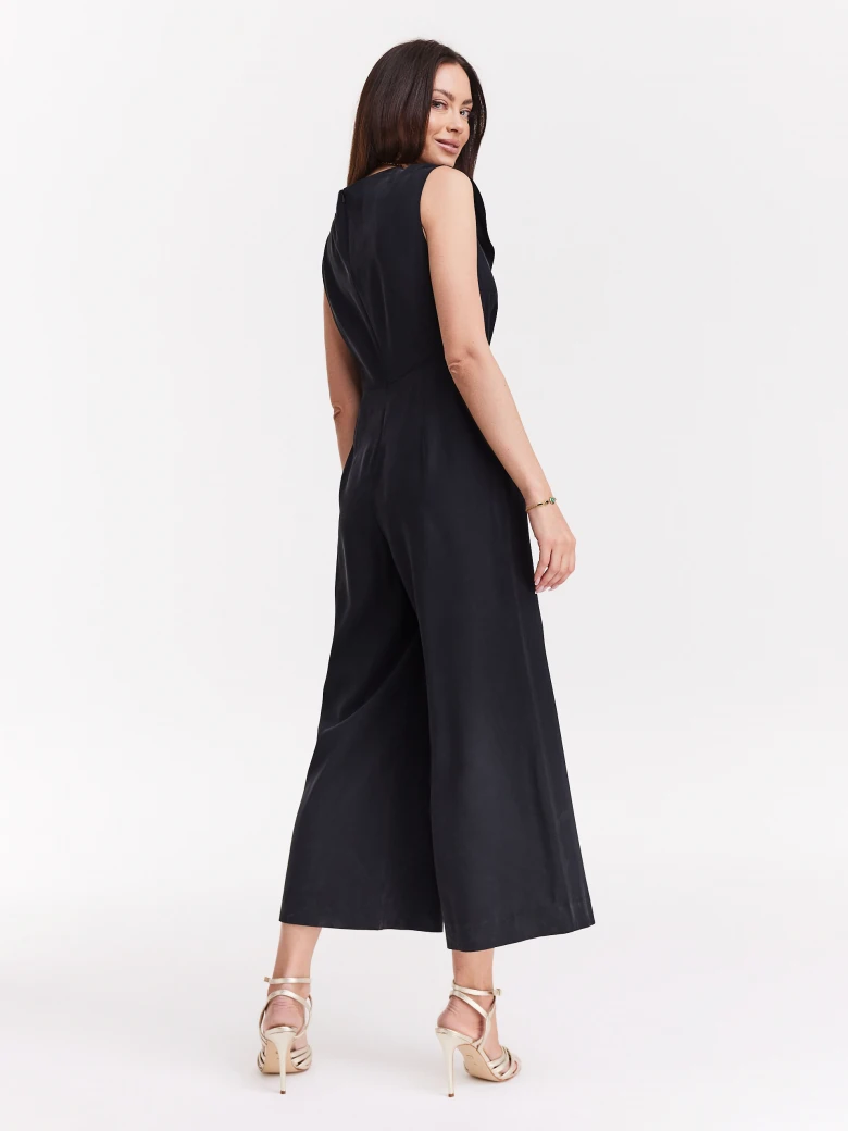 Black jumpsuit with ruffle