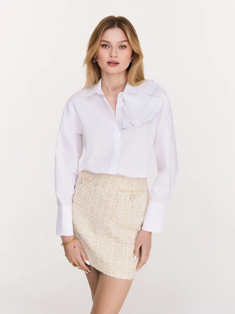White cotton shirt with decorative ruffles