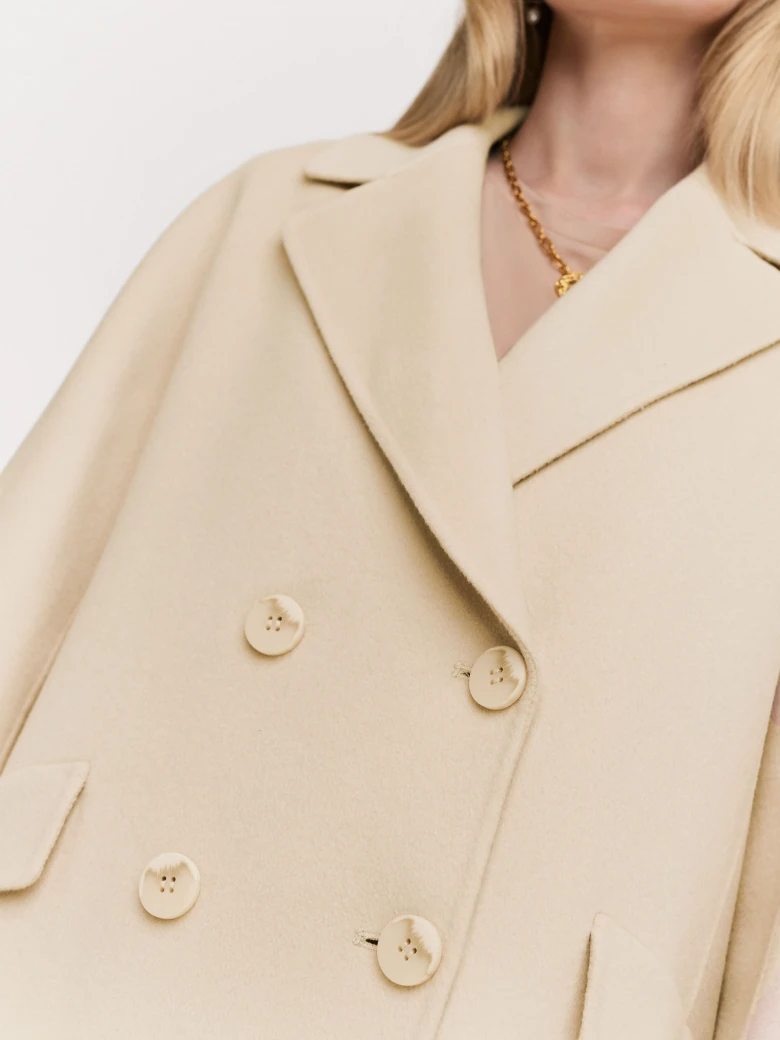 Wool cream coat with a classic cut