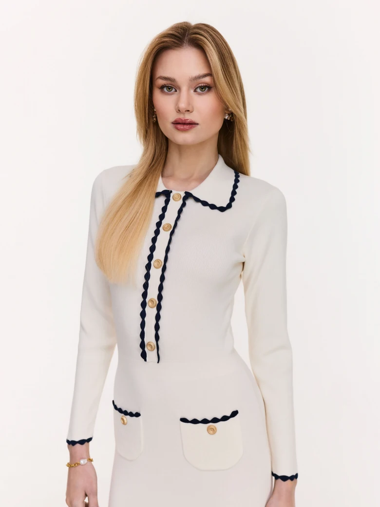 Knitted fitted dress in cream color
