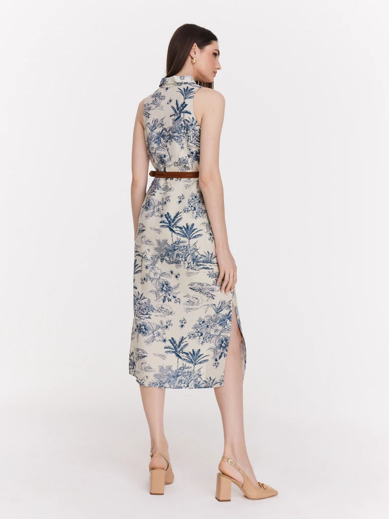 White knee-length dress with blue patterns
