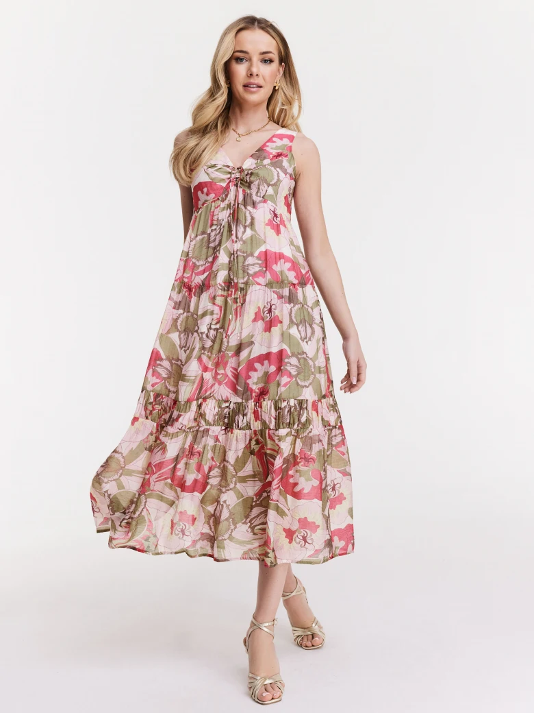 Loose pink dress with floral patterns