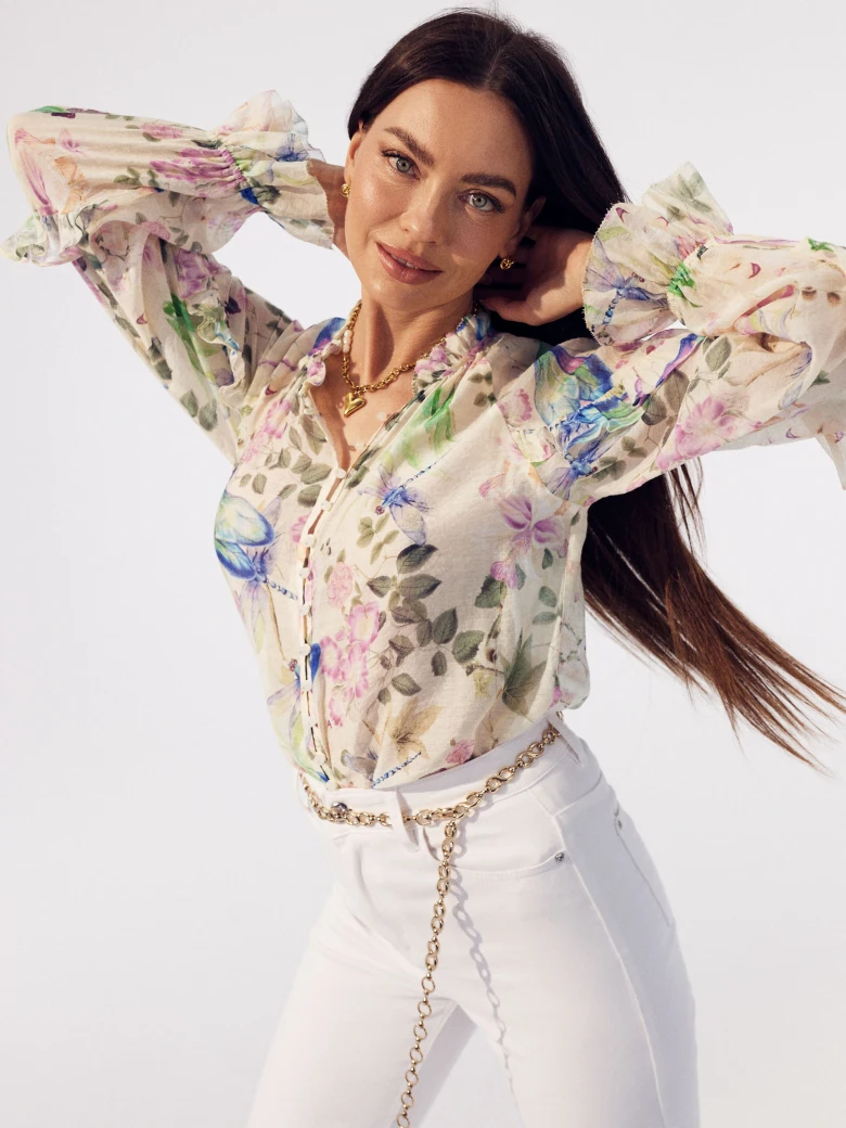 White cotton pants with flared legs