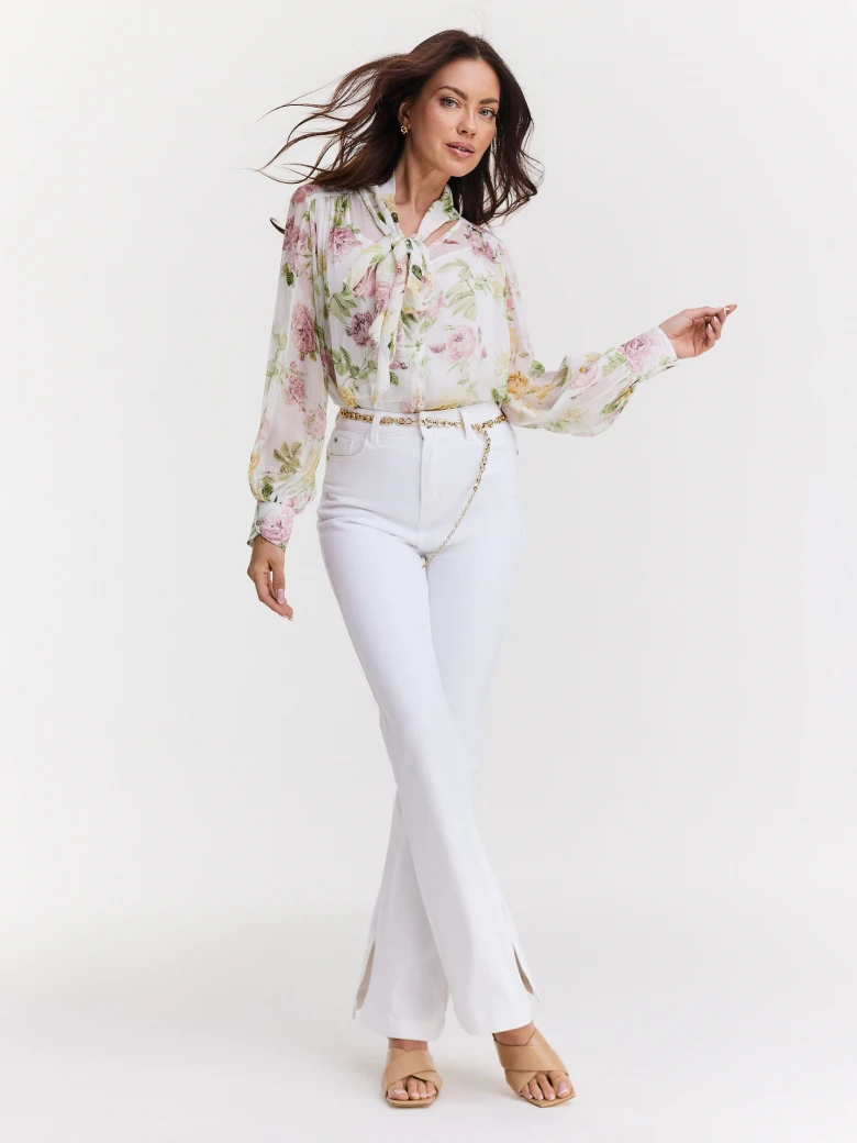 White cotton pants with flared legs