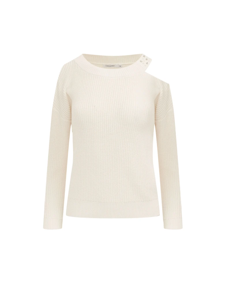 Cream sweater with striking cutouts