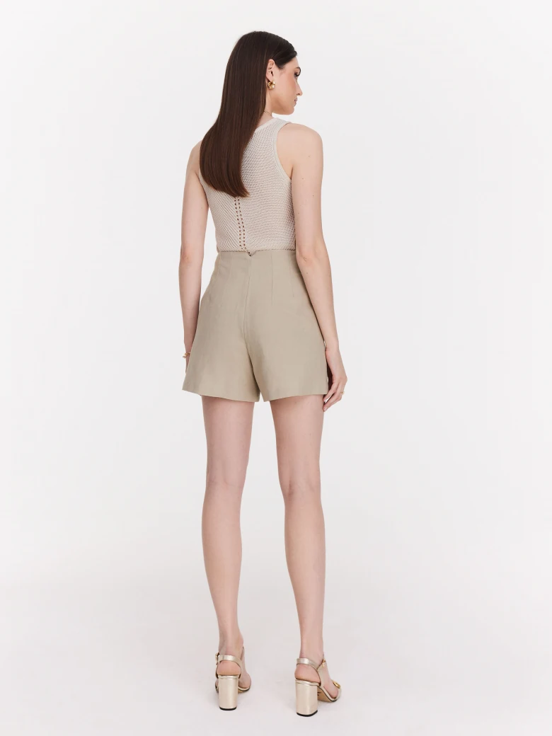 Cream openwork sleeveless sweater