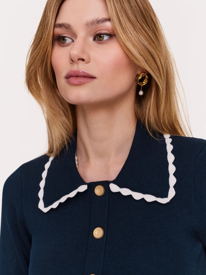 Navy blue cardigan with decorative buttons