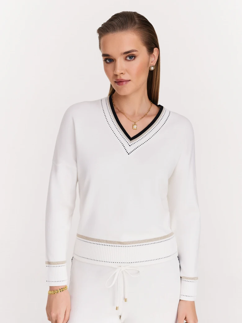 Cream sweater with V neckline