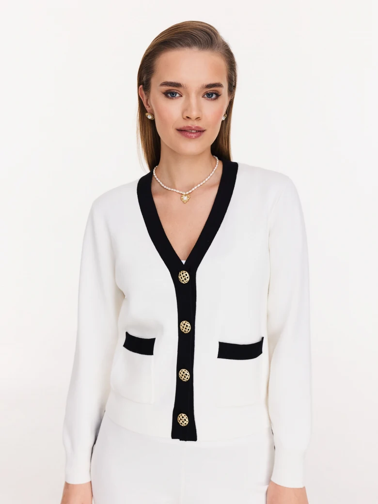 Short cream cardigan with decorative buttons