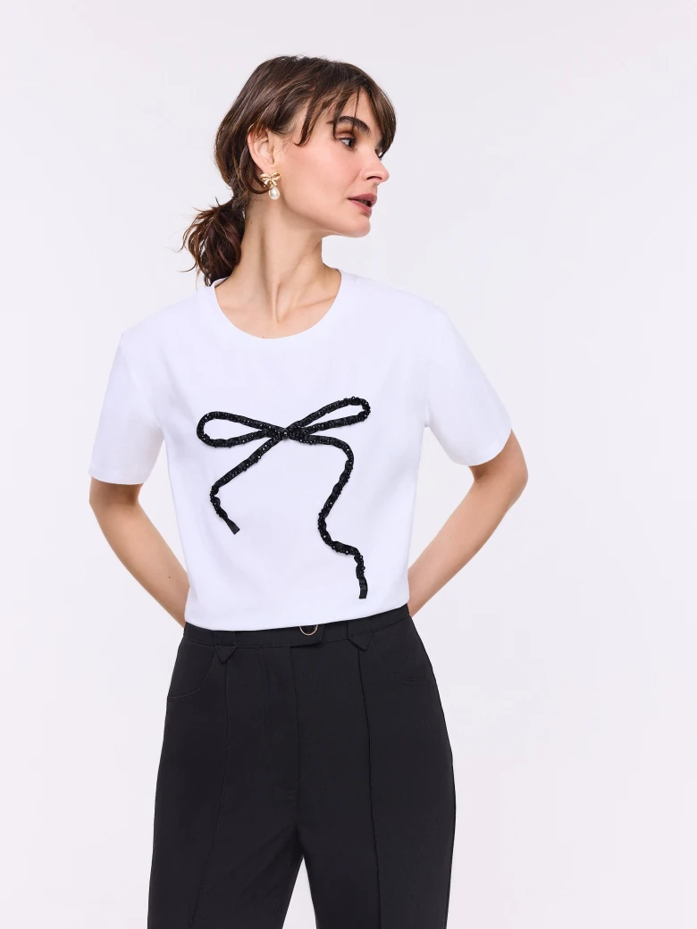 White cotton blouse with short sleeves and bow