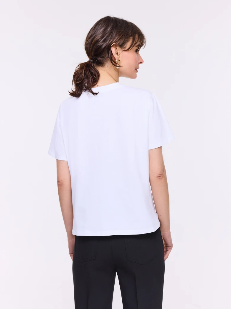 White cotton blouse with short sleeves and bow