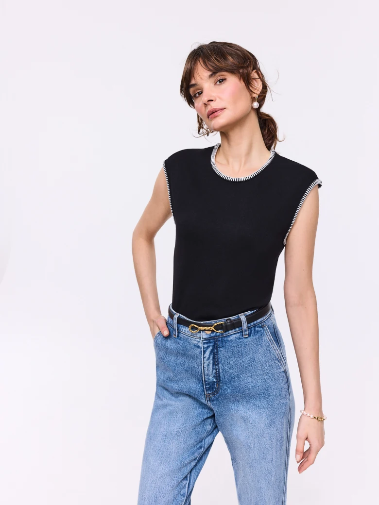 Black sleeveless top with decorative trim
