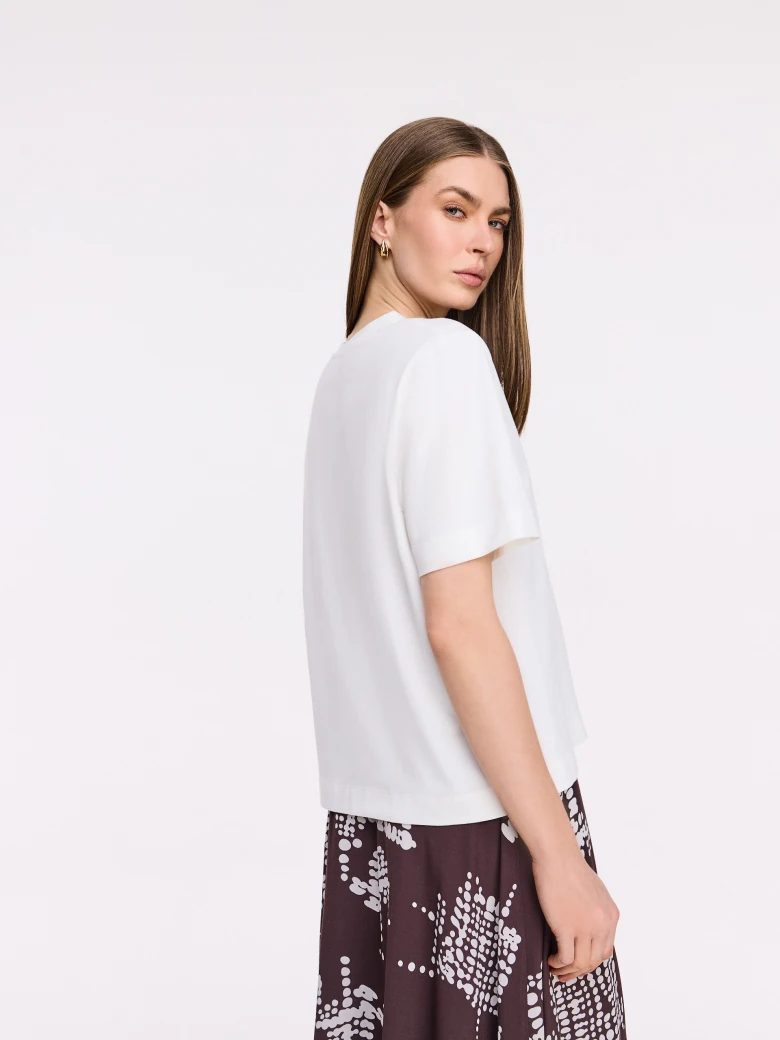 White cotton blouse with lace insert