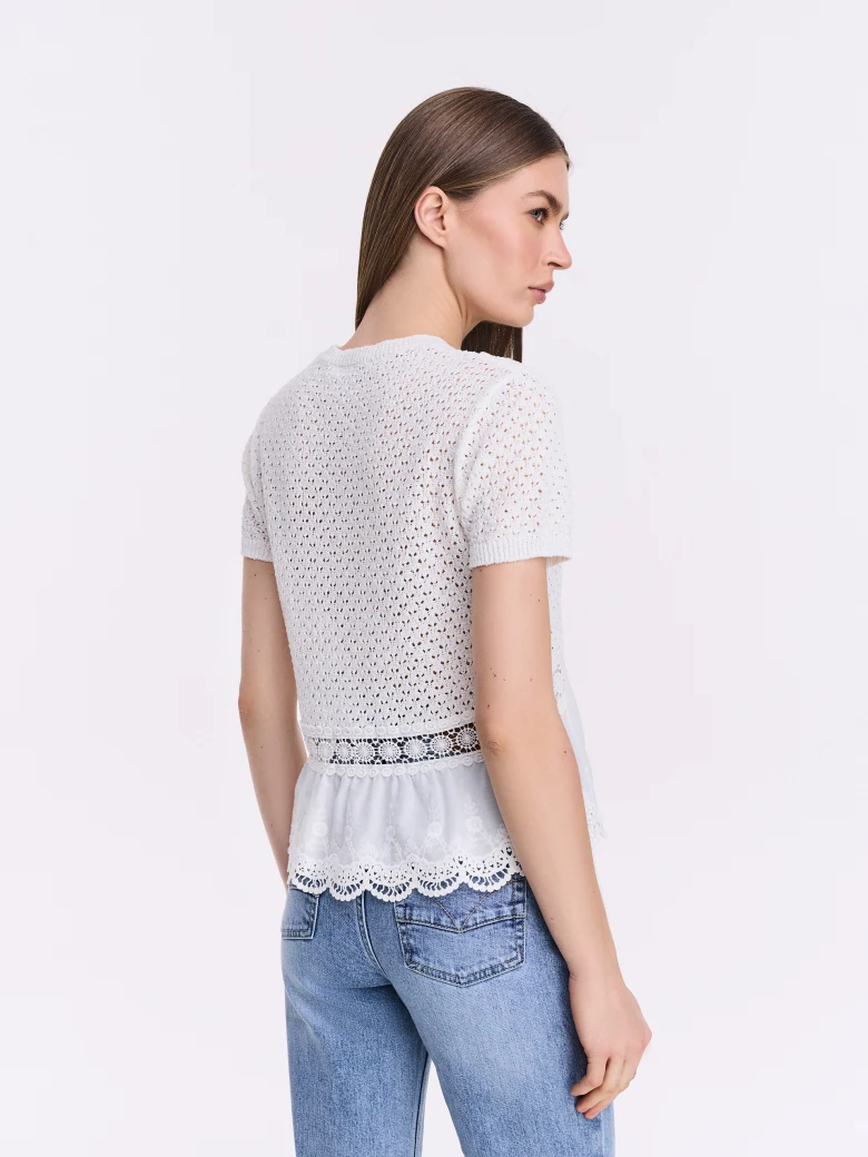 White blouse with peplum and lace details