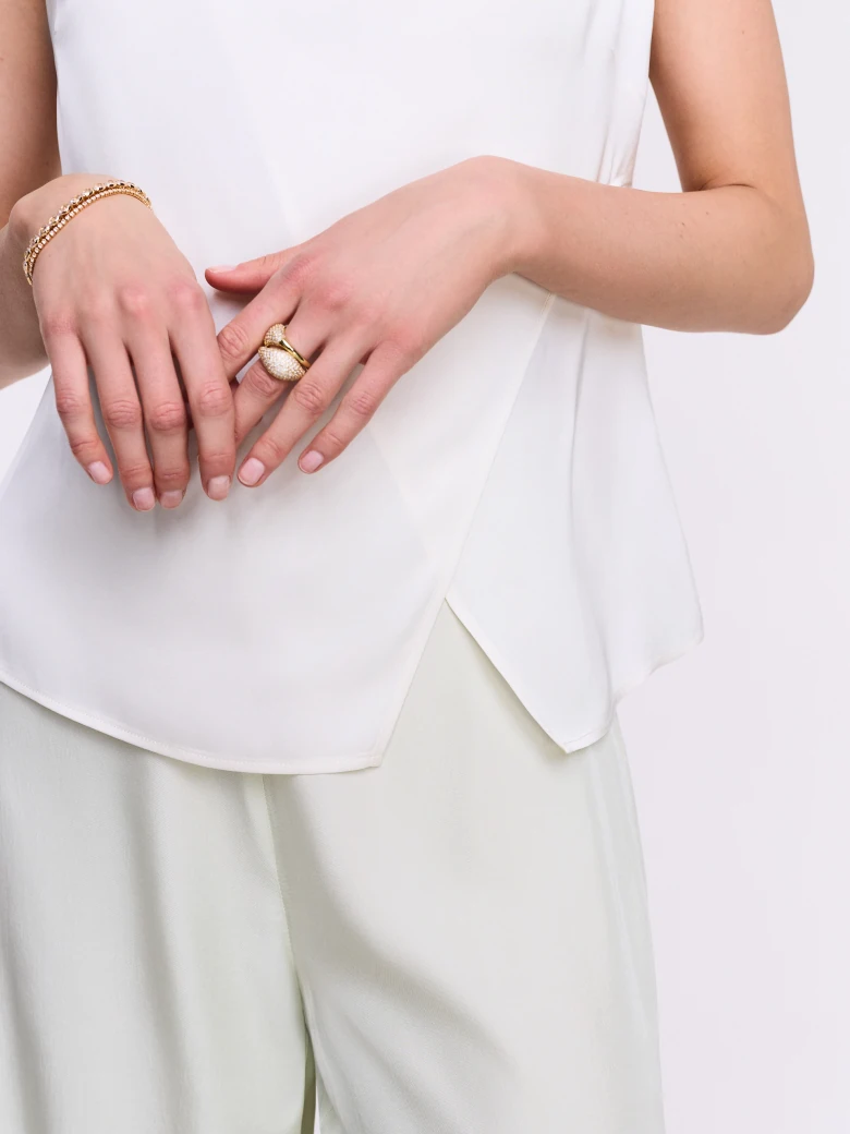 Asymmetrical sleeveless blouse