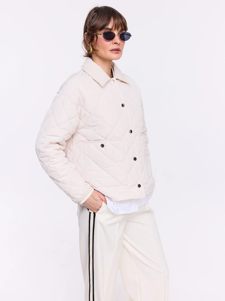 Short quilted jacket in ecru
