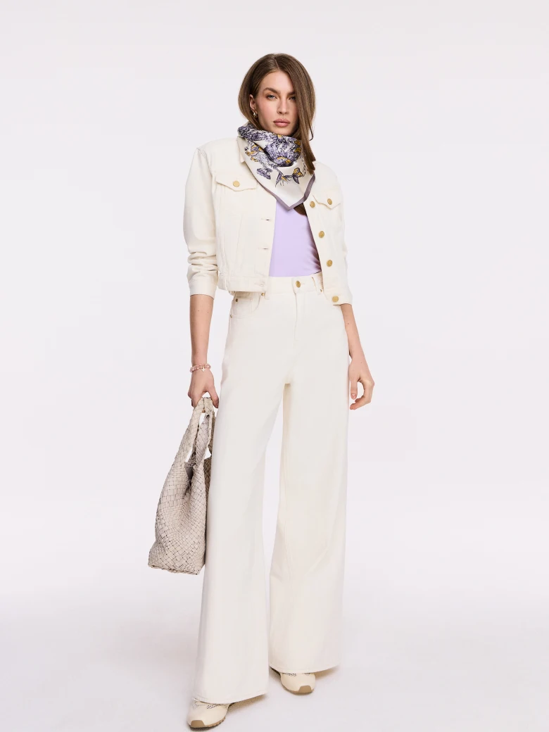 Cream denim jacket with gold buttons
