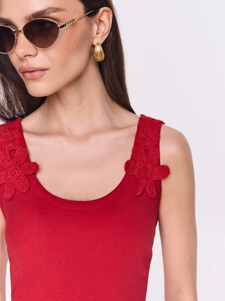 Red midi dress with decorative straps