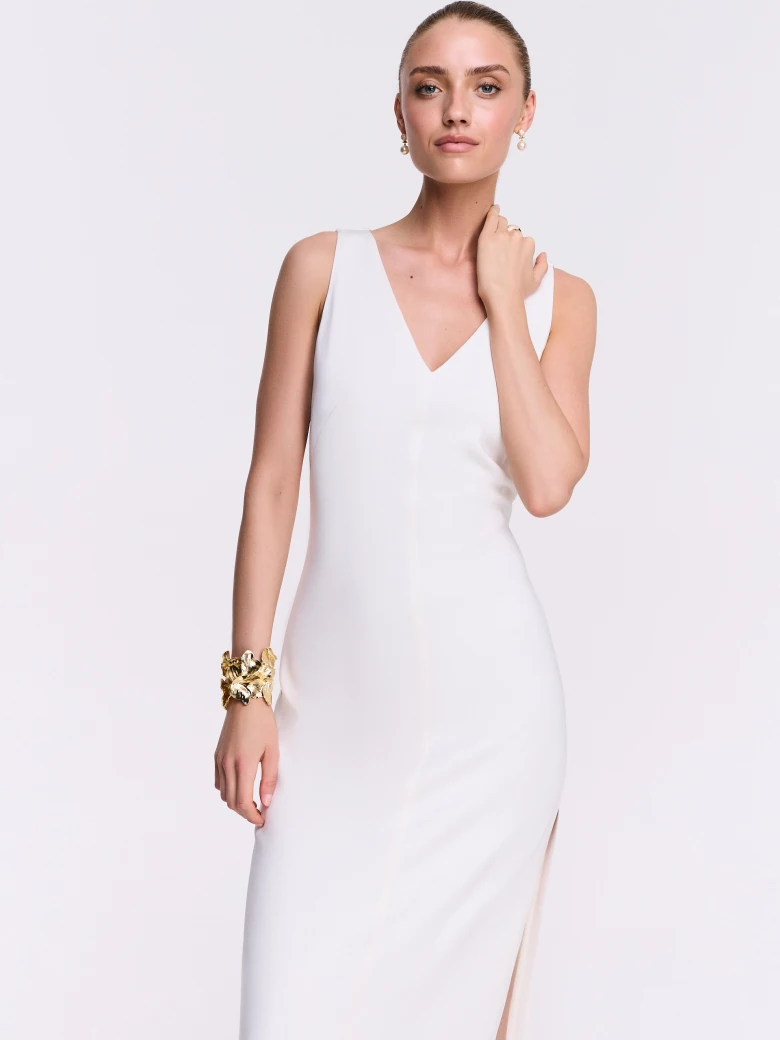 Cream midi dress with decorative appliqué