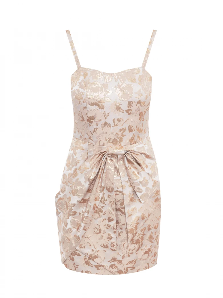A mini dress in a cream and gold shade
