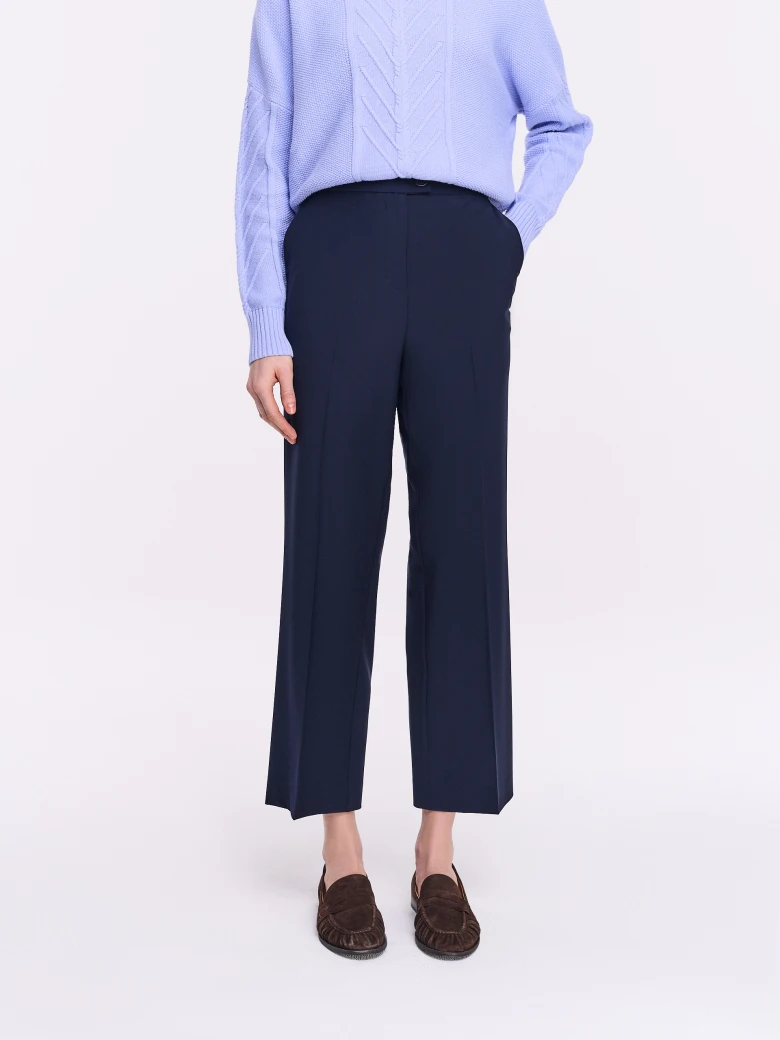 Navy blue high-waisted pants with ⅞ length legs