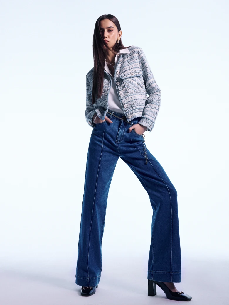High-waisted jeans with decorative stitching