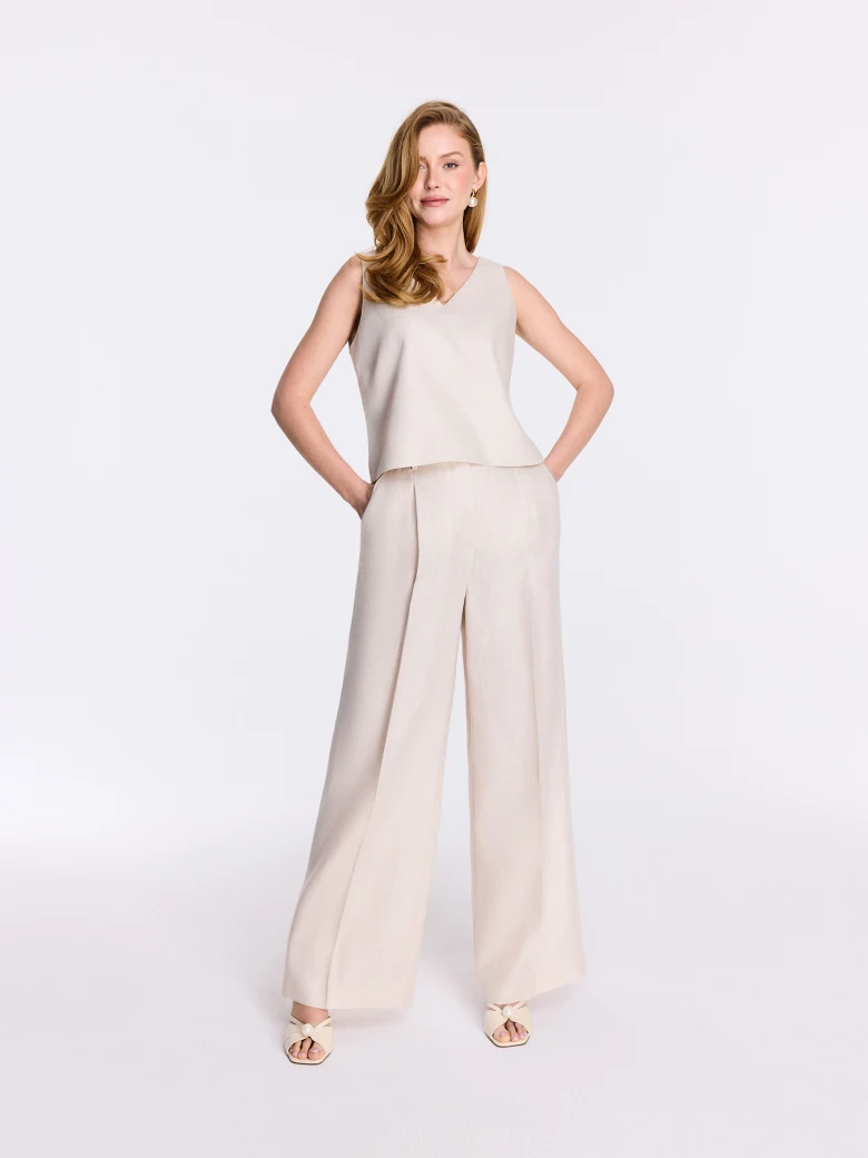 Beige high-waisted pants with metallic thread