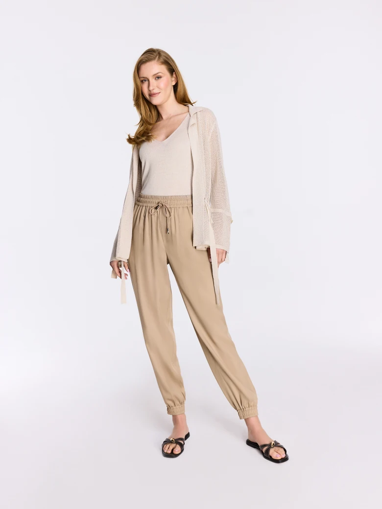 Beige high-waisted jogger pants