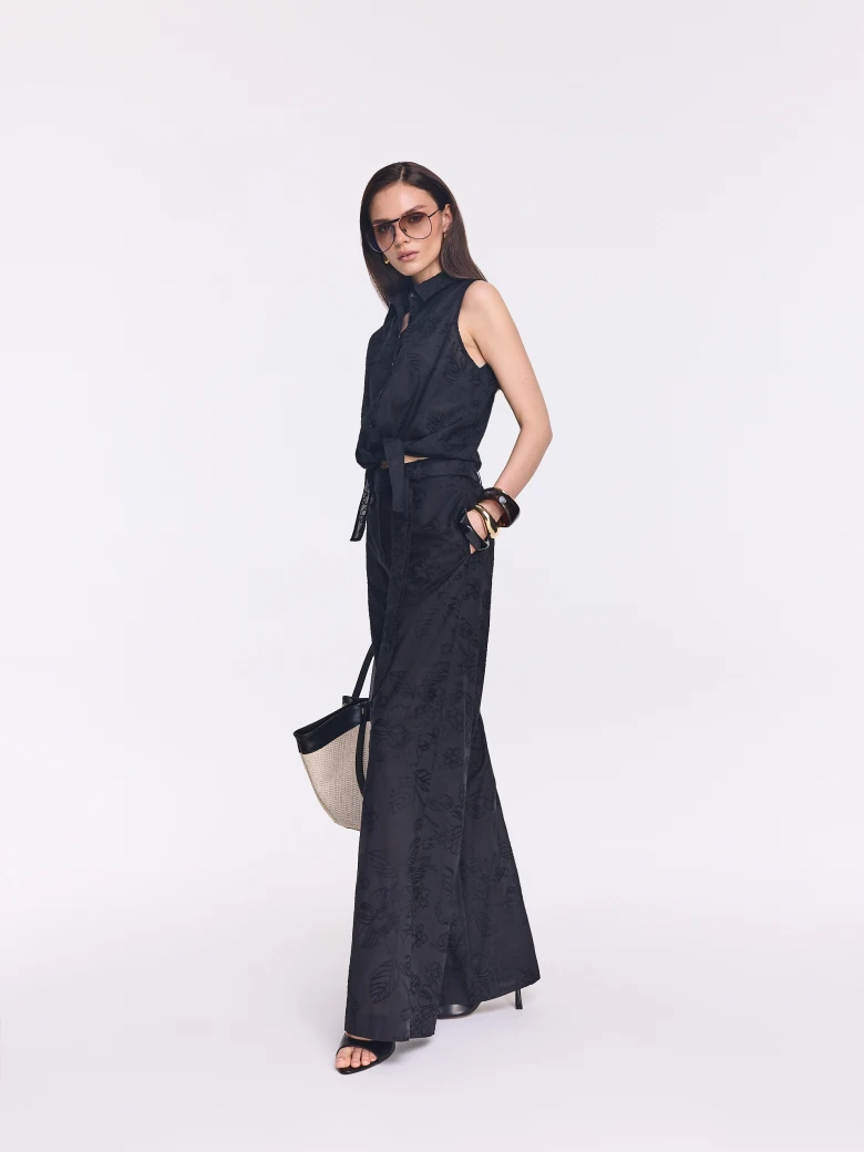 Black wide-leg pants with floral embroidery
