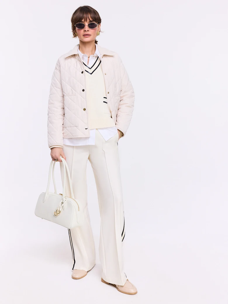Cream pants with black piping