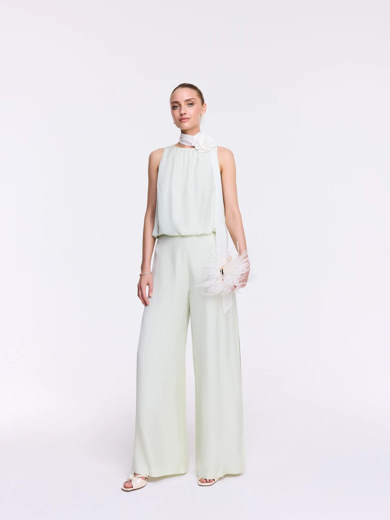 Wide-leg pants with a slit in a pastel mint shade