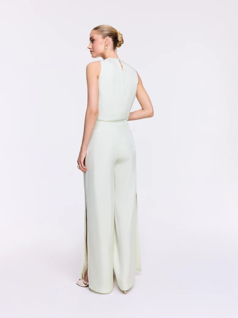 Wide-leg pants with a slit in a pastel mint shade