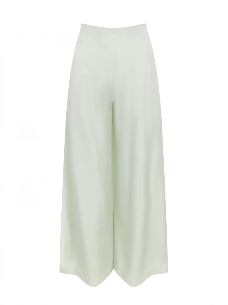 Wide-leg pants with a slit in a pastel mint shade