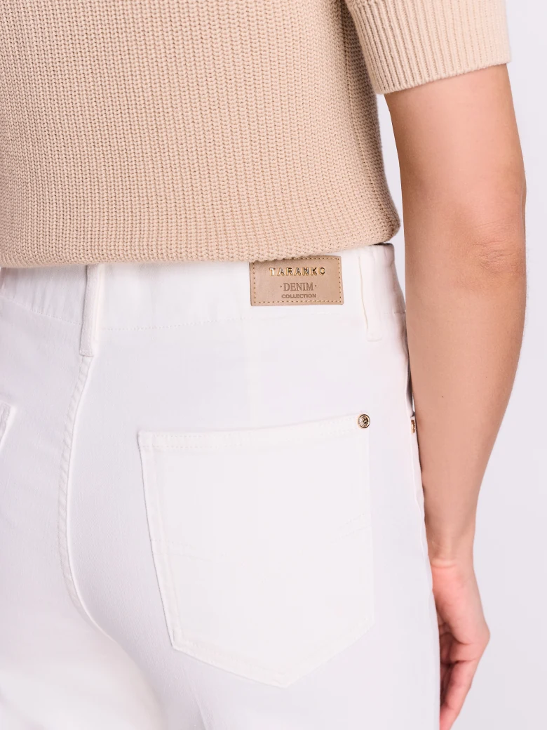 White high-waisted jeans with straight legs