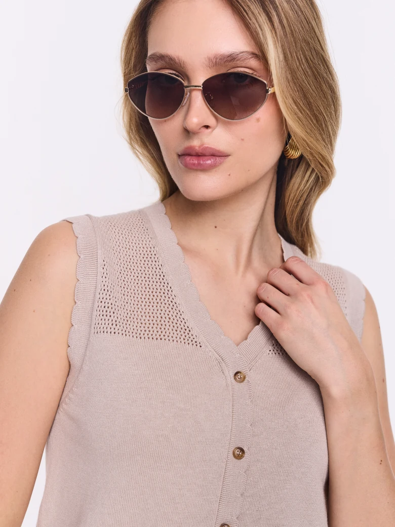 Beige button-down vest