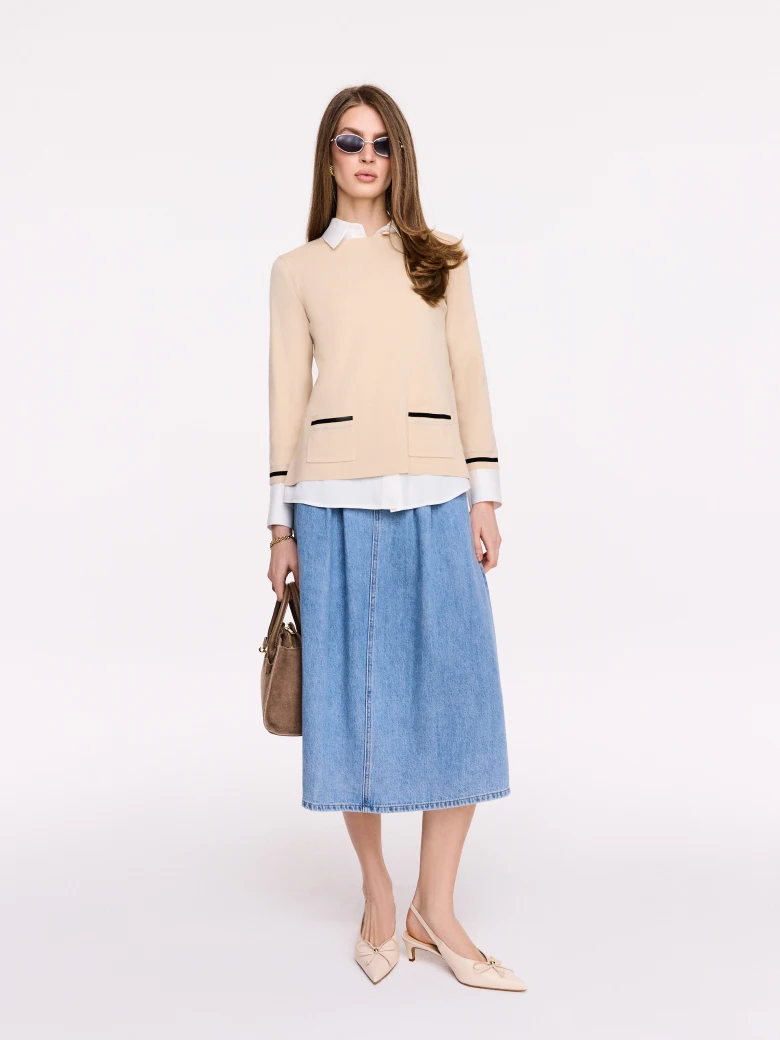 Light beige sweater with decorative trim