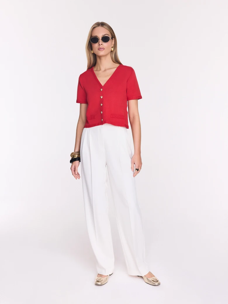 Red sweater with decorative buttons