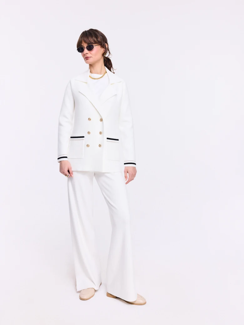 Cream double-breasted jacket with decorative piping