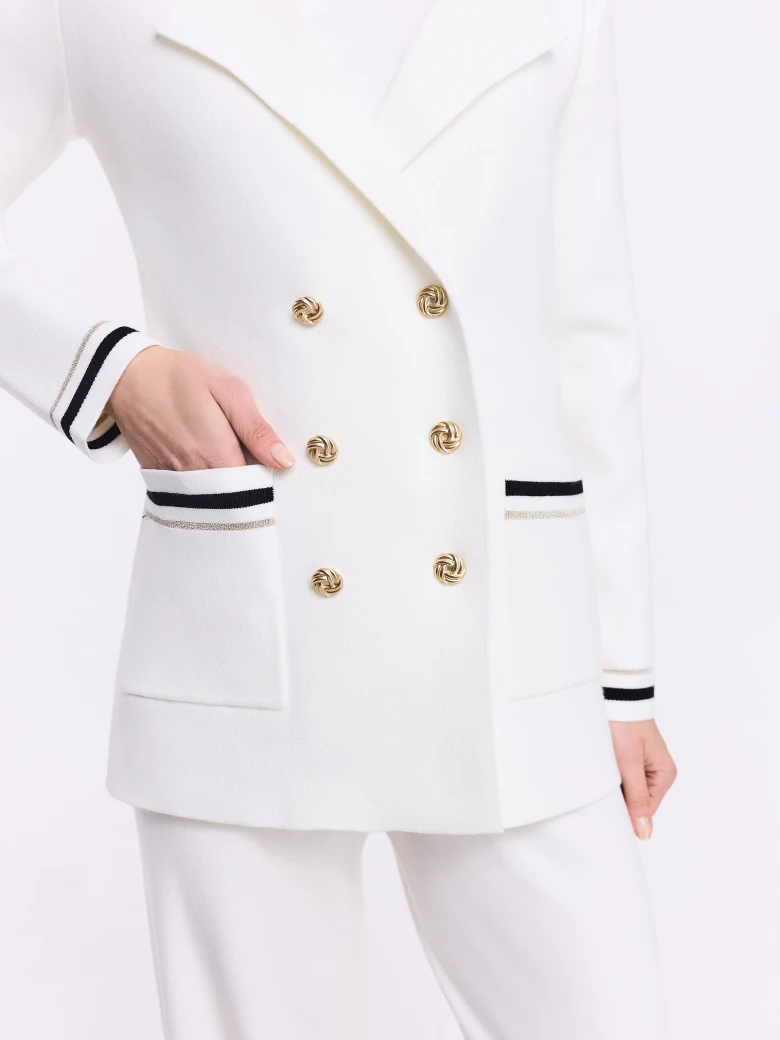 Cream double-breasted jacket with decorative piping