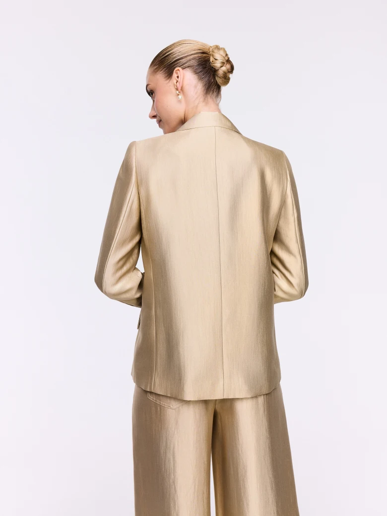 A gold-toned blazer
