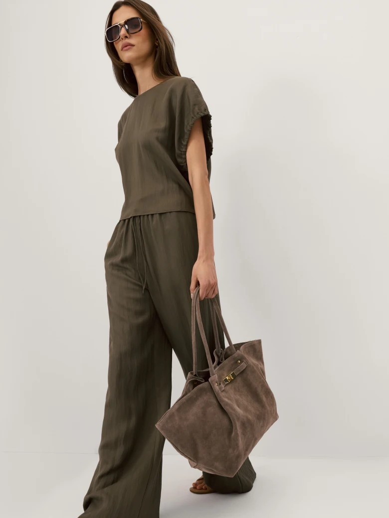 Olive-coloured blouse with a cut-out at the back