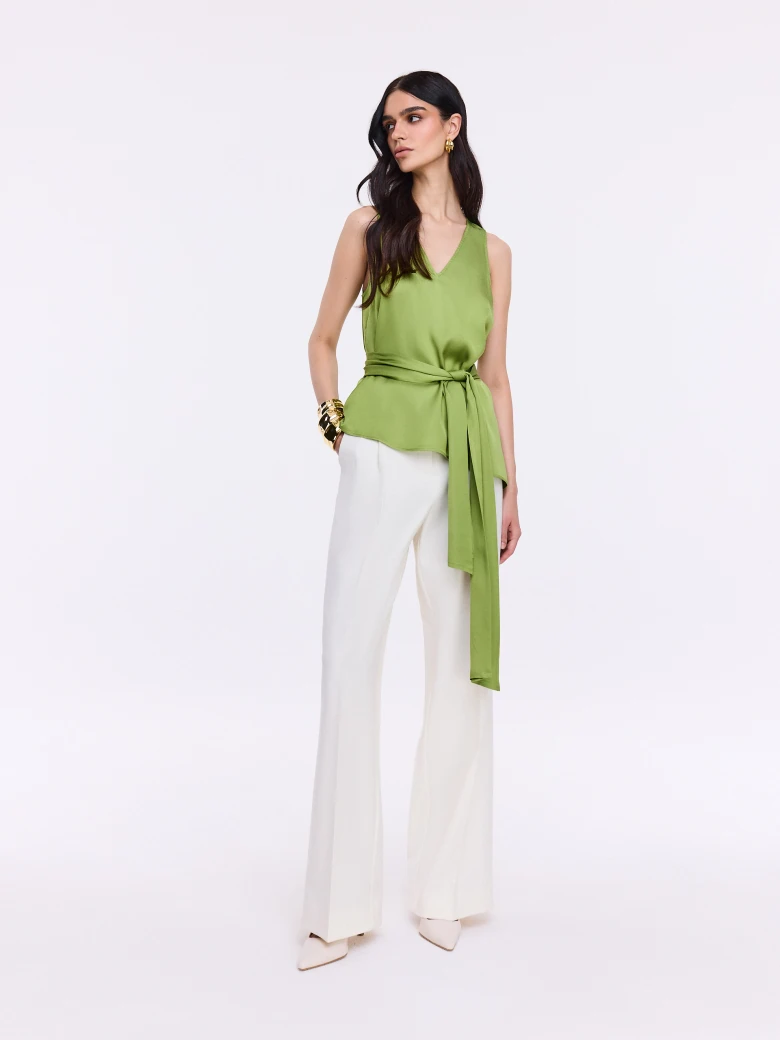 Green satin blouse with a sash