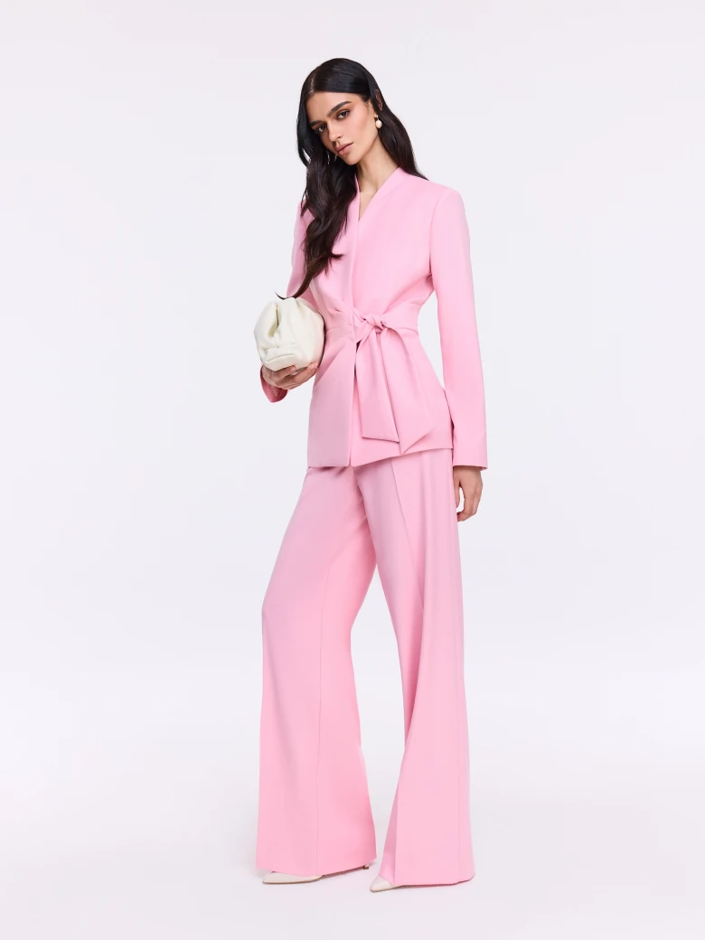Unique pink jacket with a tie at the waist