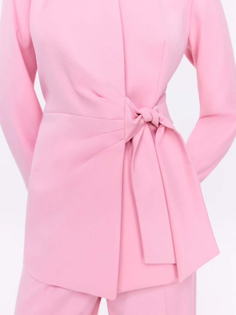 Unique pink jacket with a tie at the waist