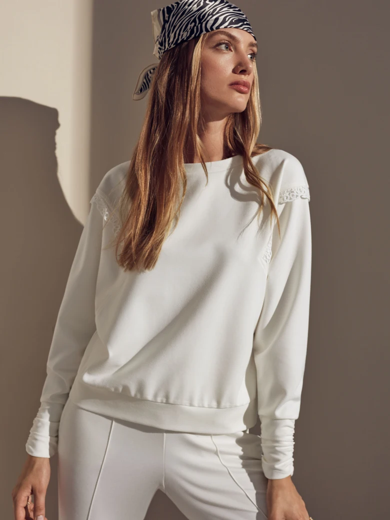 White blouse with pleats and frill