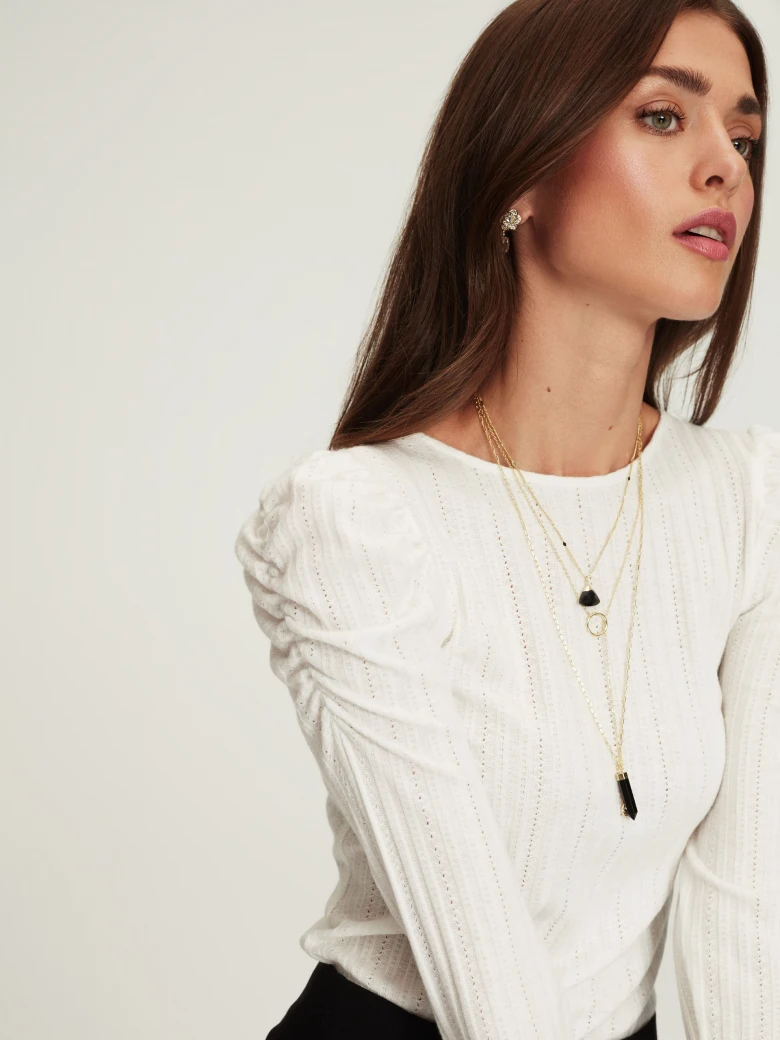 White blouse with delicate buffs