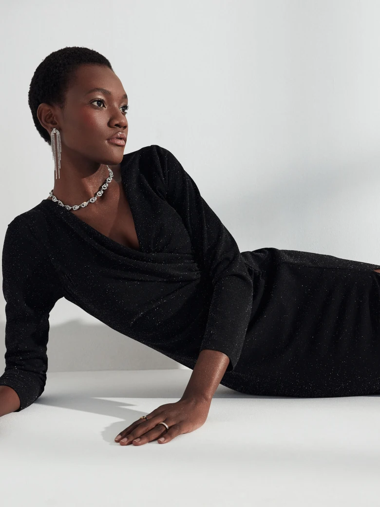 Fitted dress made of shiny material