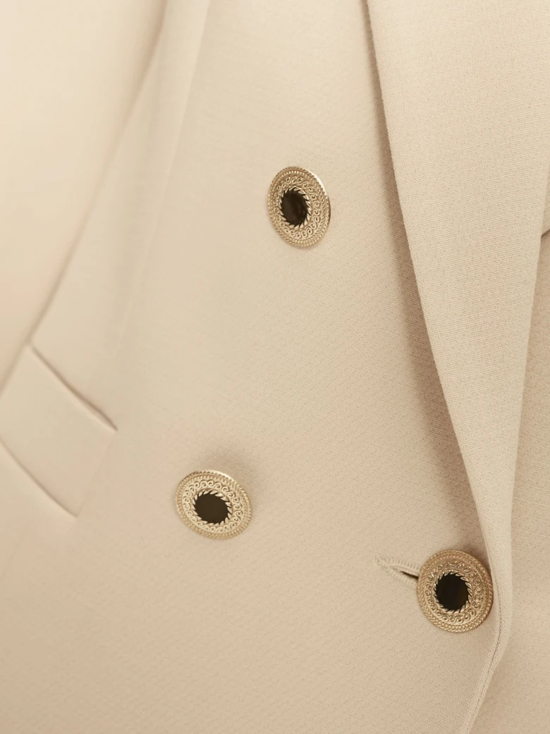 Blazer with decorative buttons